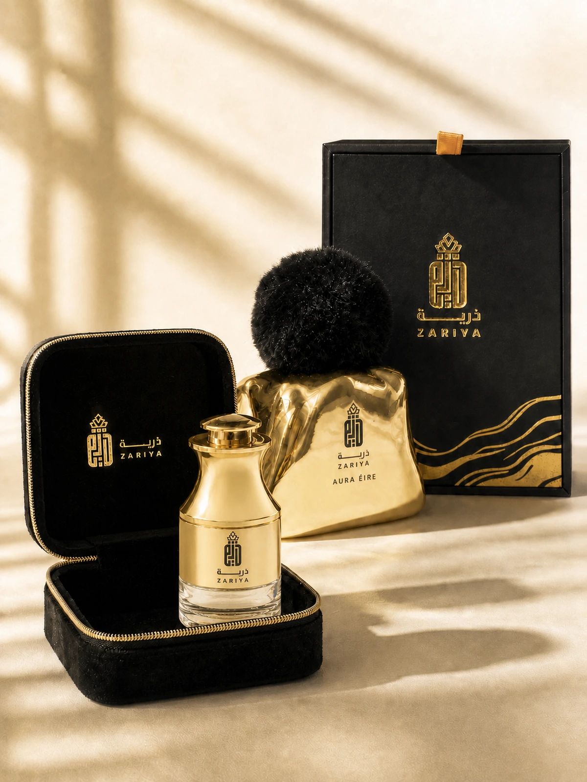 A Zariya gold bottle in its black and gold gift box